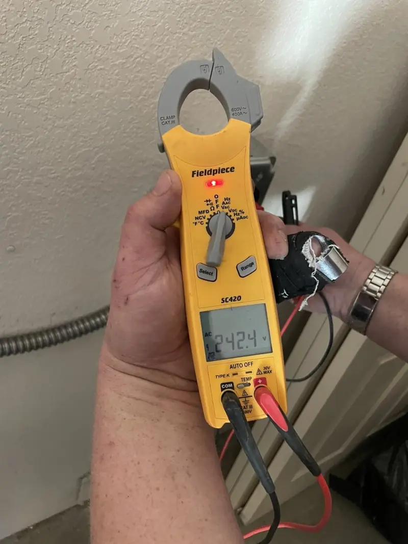 Voltage testing with clamp meter during Hot Tub / Pool Electrical Wiring in Long Beach
